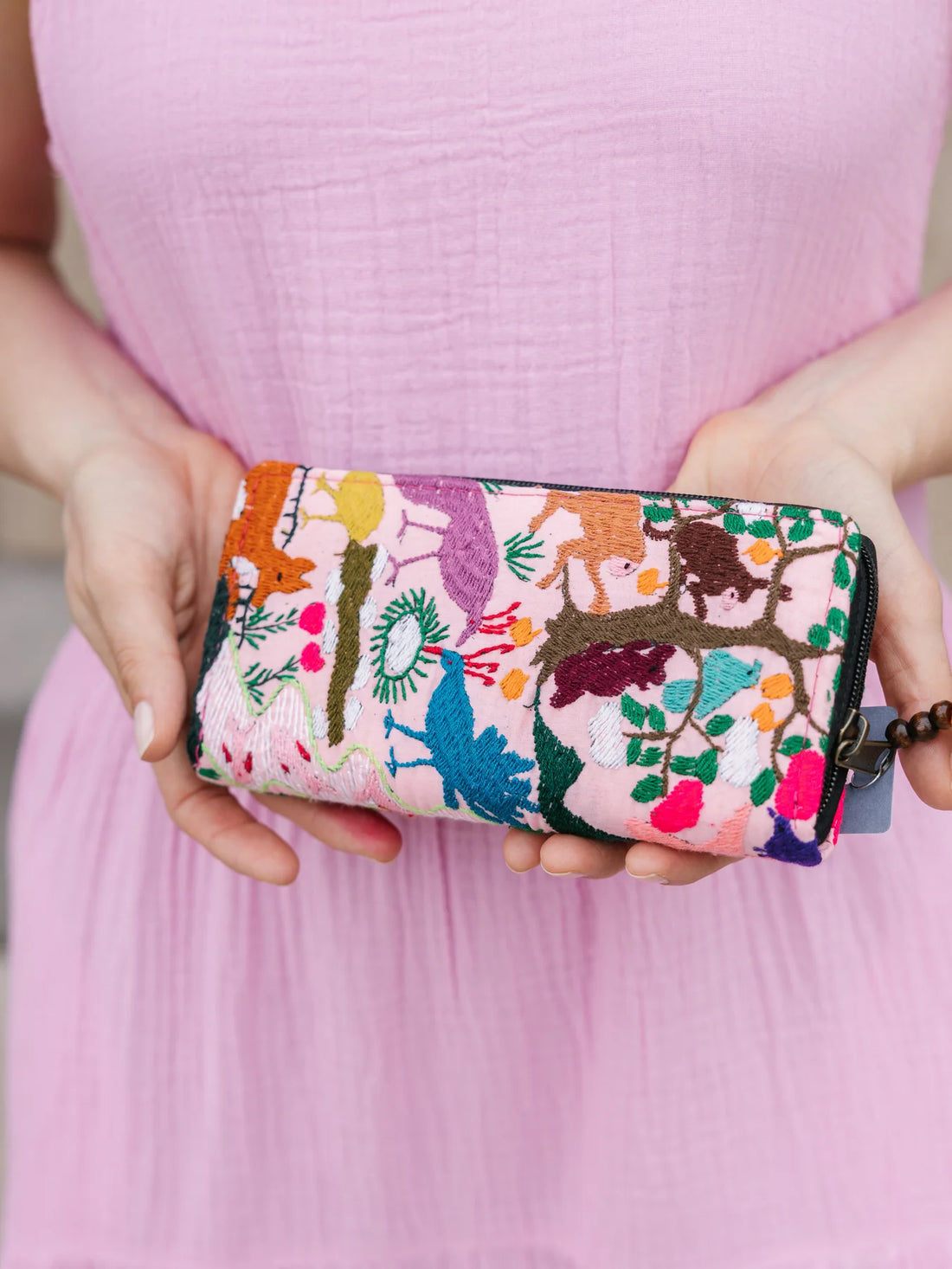 Fauna wallet held in hands